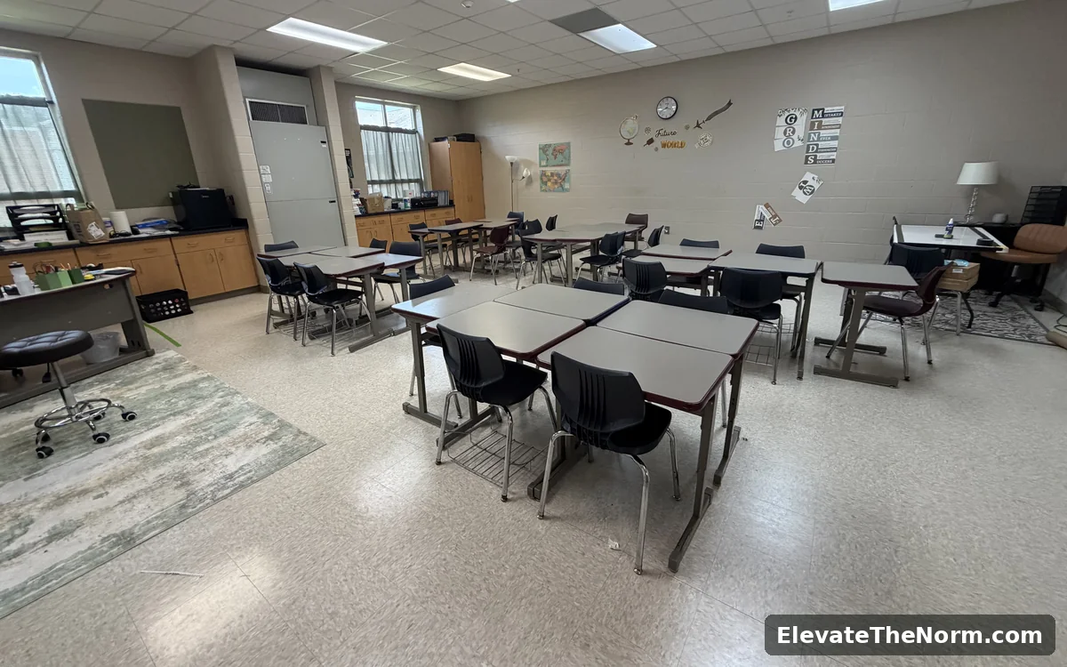Classroom tables pushed together into pairs and groups of four, with no desks arranged in rows facing the front.
